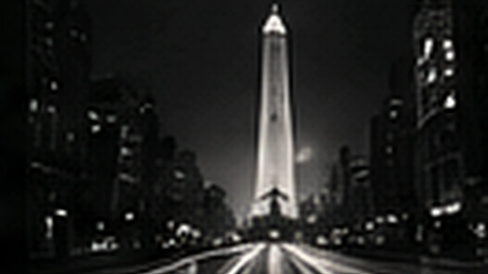 El Obelisco de noche, con Buenos Aires alrededor.